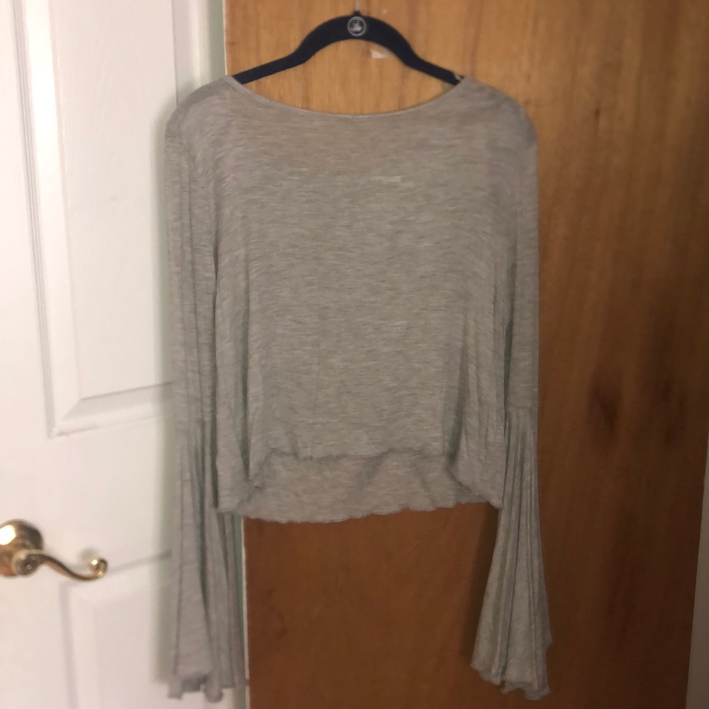Light gray long sleeve top with bell sleeves